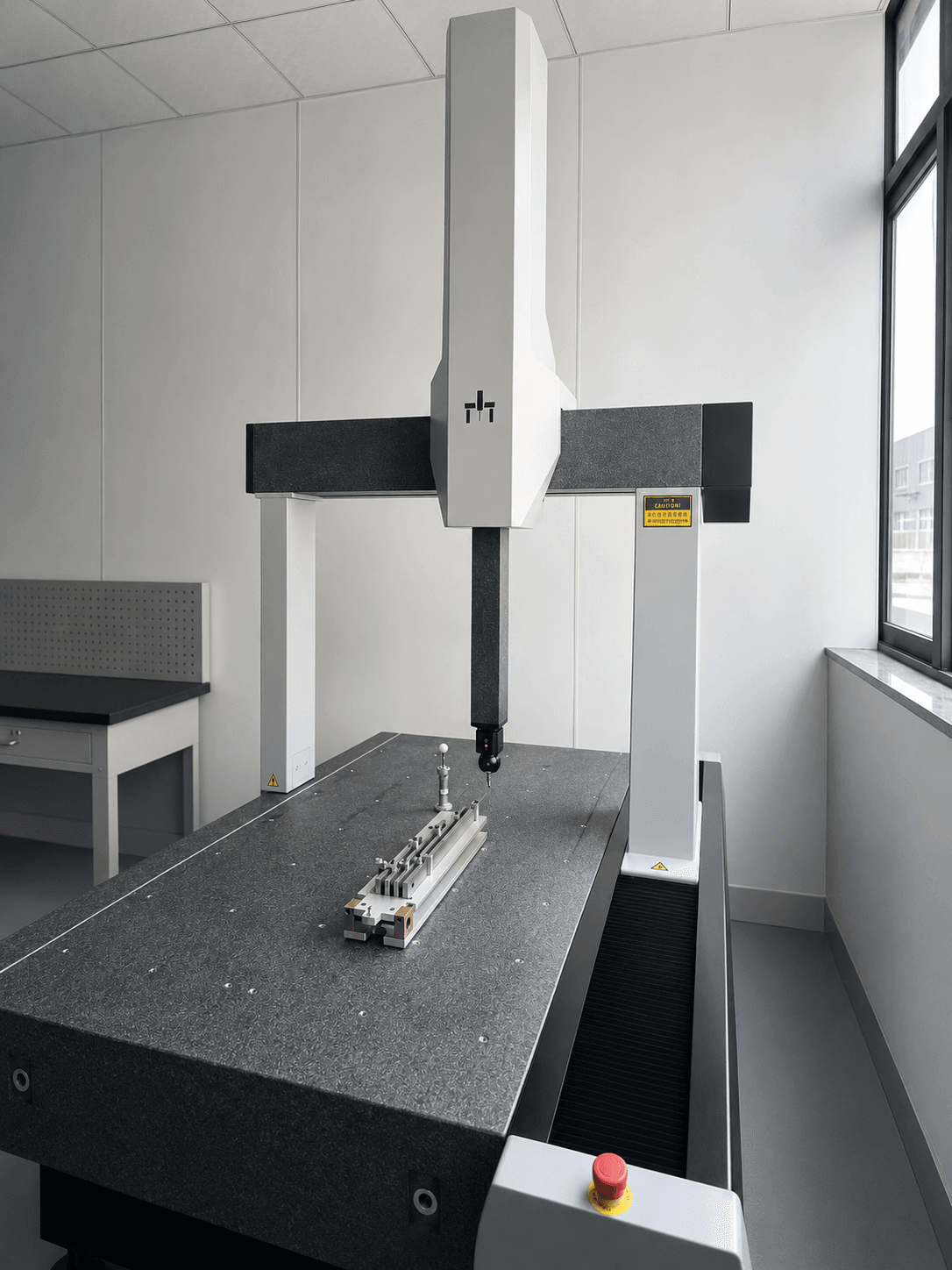 PeakMerit Polaris bridge CMM measuring a fixture